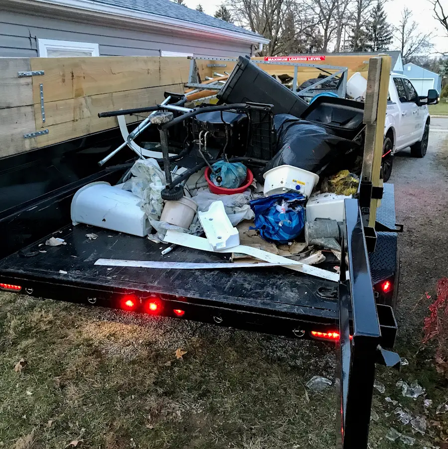Roll-off dumpster delivered to a residential driveway in Lincoln Heights