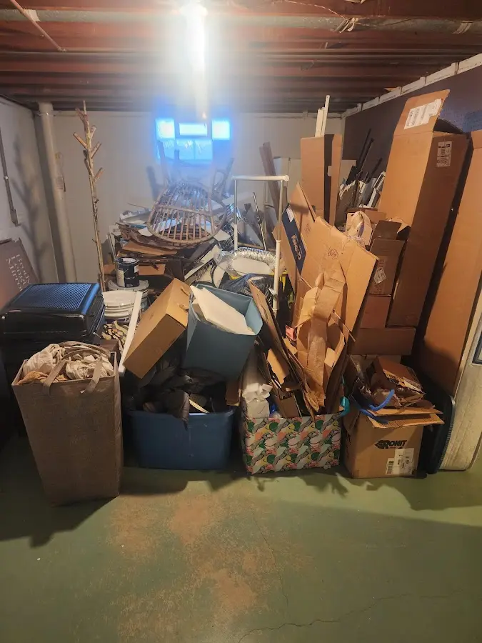 Roll-off dumpster container at job site for 2 Yard Dumpster Rental in Lincoln Heights